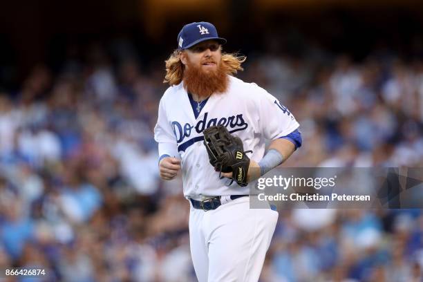 Justin Turner of the Los Angeles Dodgers jogs during the first inning against the Houston Astros in game two of the 2017 World Series at Dodger...