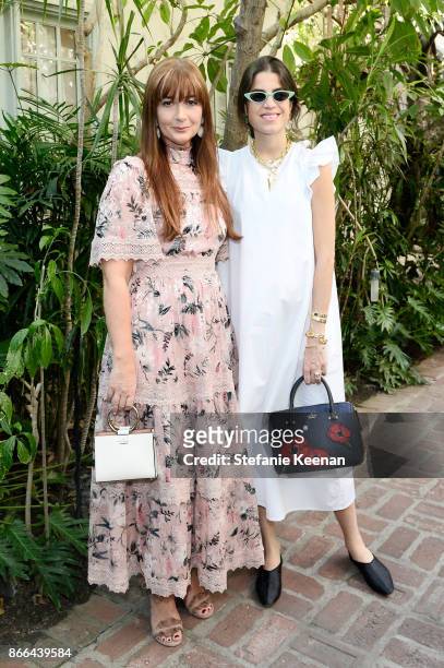 Deborah Lloyd and Leandra Medine attend CFDA/Vogue Fashion Fund Show and Tea at Chateau Marmont at Chateau Marmont on October 25, 2017 in Los...