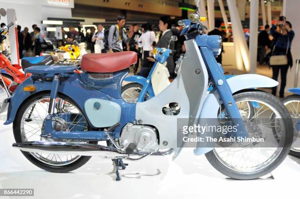 Honda Motor Co's C100, first edition of 'Super Cub' is displayed during the 45th Tokyo Motor Show at Tokyo Big Sight on October 25, 2017 in Tokyo,...
