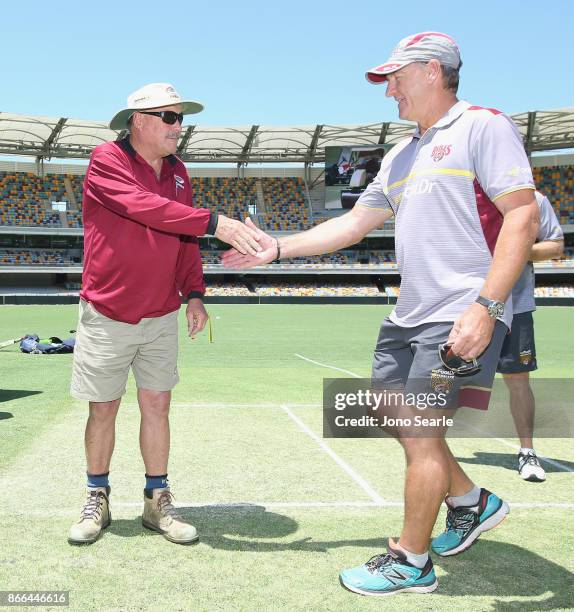 Retiring Gabba Curator Kevin Mitchell is thanked by Andy Bichel and the QLD team during day one of the Sheffield Shield match between Queensland and...