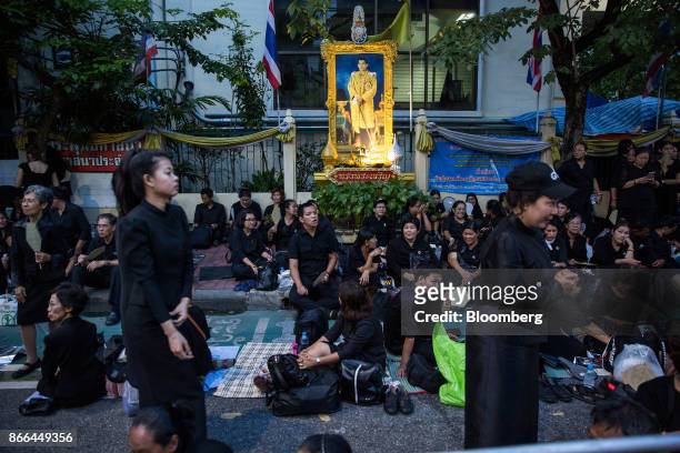 Thai mourners gather near the Royal Crematorium ahead of the cremation of the late King Bhumibol Adulyadej in Bangkok, Thailand, on Wednesday, Oct....