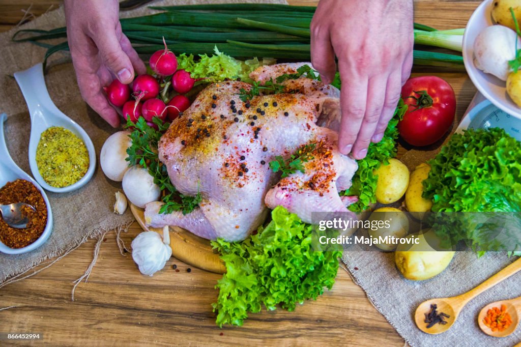 Man preparing chicken