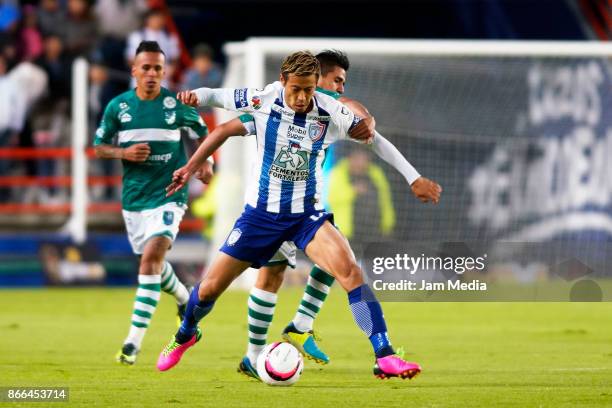 Keisuke Honda of Pachuca fights for the ball with Julio Gomez of Zacatepec during the round of sixteen match between Pachuca and Zacatepec as part of...