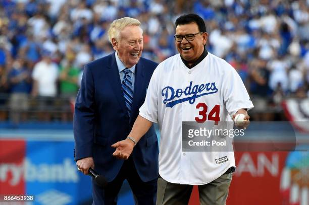 Former Los Angeles Dodgers broadcaster Vin Scully talks with former Los Angeles Dodgers player Fernando Valenzuela prior to the ceremonial first...