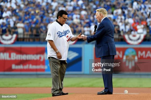 Former Los Angeles Dodgers broadcaster Vin Scully talks with former Los Angeles Dodgers player Fernando Valenzuela prior to the ceremonial first...