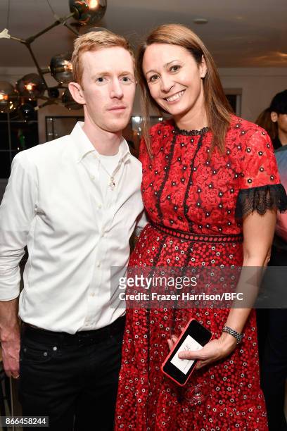 Jordan Askill and Chief Executive of the British Fashion Council Caroline Rush attend The Fashion Awards 2017 nominees cocktail reception at...