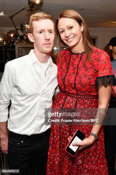 Jordan Askill and Chief Executive of the British Fashion Council Caroline Rush attend The Fashion Awards 2017 nominees cocktail reception at...