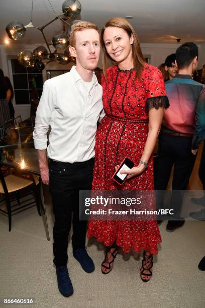 Jordan Askill and Chief Executive of the British Fashion Council Caroline Rush attend The Fashion Awards 2017 nominees cocktail reception at...