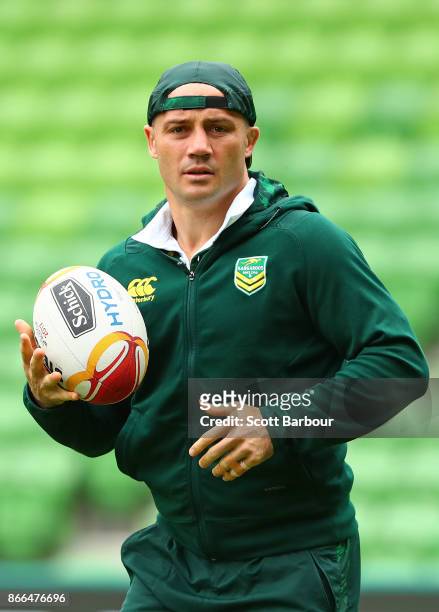 Cooper Cronk of the Kangaroos runs with the ball during an Australian Kangaroos training session on October 26, 2017 in Melbourne, Australia.