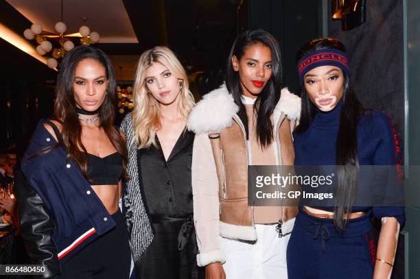 Joan Smalls, Devon Windsor, Grace Mahary and Winnie Harlow attend the Moncler dinner in celebration of the boutique grand opening on October 25, 2017...