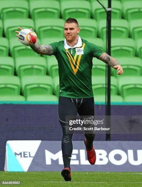 Josh Dugan of the Kangaroos runs with the ball during an Australian Kangaroos training session on October 26, 2017 in Melbourne, Australia.