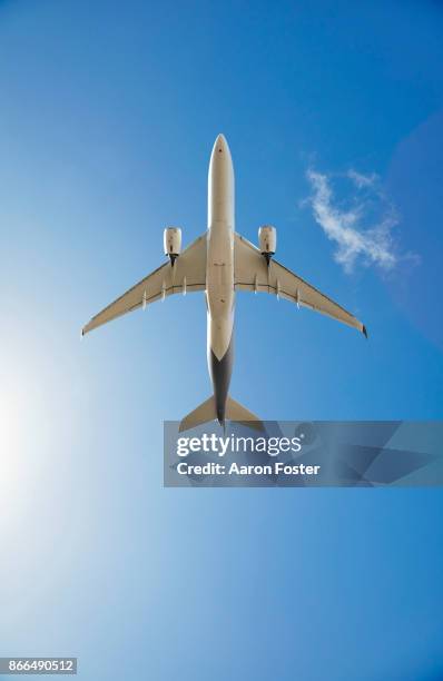 a350-900 directly below - aeroplane sky stock pictures, royalty-free photos & images