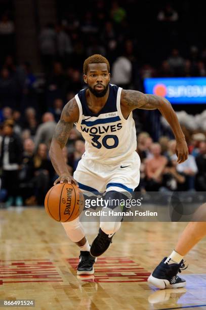 Aaron Brooks of the Minnesota Timberwolves dribbles the ball against the Indiana Pacers during the game on October 24, 2017 at the Target Center in...