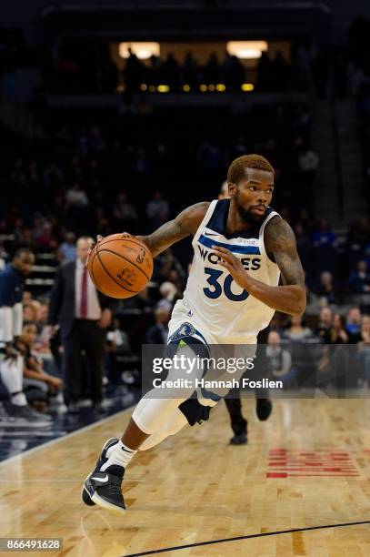 Aaron Brooks of the Minnesota Timberwolves dribbles the ball against the Indiana Pacers during the game on October 24, 2017 at the Target Center in...