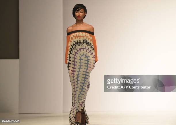 Model displays a creation by Amede at the Lagos Fashion and Design Week in Lagos on October 25, 2017. The yearly Lagos Fashion and Design Week is...