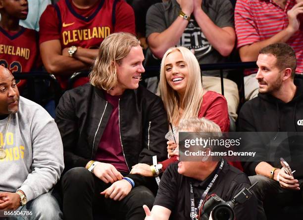 Noah Syndergaard and Alexandra Cooper attend the Cleveland Cavaliers Vs Brooklyn Nets game at Barclays Center on October 25, 2017 in New York City.