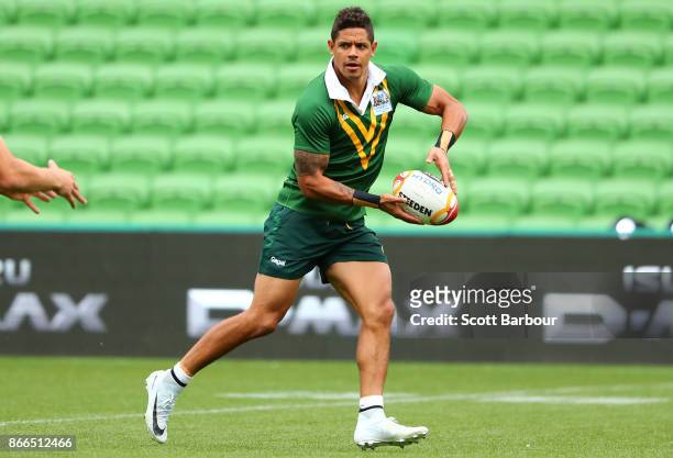 Dane Gagai of the Kangaroos runs with the ball during an Australian Kangaroos training session on October 26, 2017 in Melbourne, Australia.