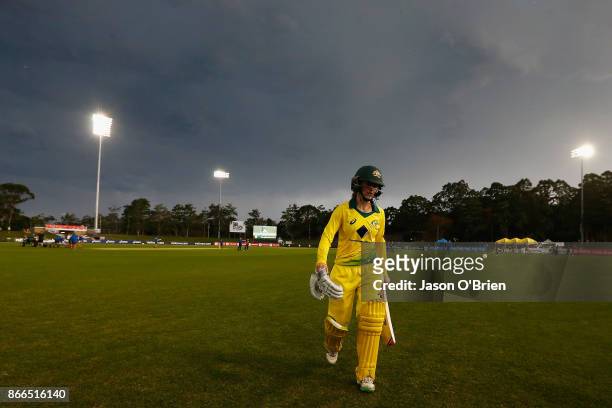 Australia's Rachael Haynes walks off after her innings during the Women's One Day International match between Australia and England on October 26,...