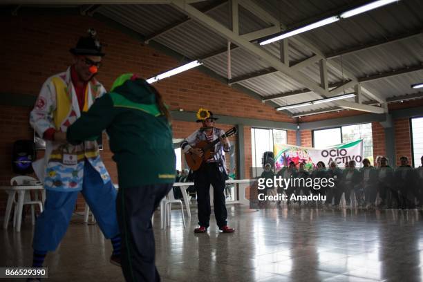 Members of Dr. Clown team perform in Mosquera, Cundinamarca, a small town close to Bogota, Colombia on October 25, 2017. Medical smile therapy...