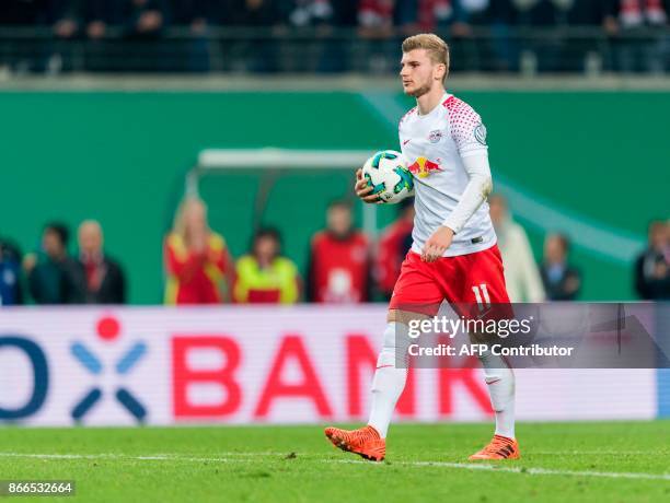 Leipzig's forward Timo Werner arrives for a penalty kick shootout during the German Cup football match RB Leipzig v FC Bayern Munich in Leipzig,...