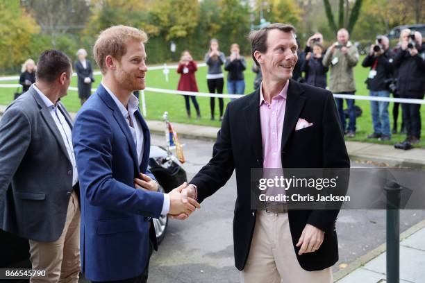 Prince Joachim of Denmark greets Prince Harry as they on October 26, 2017 in Copenhagen, Denmark.