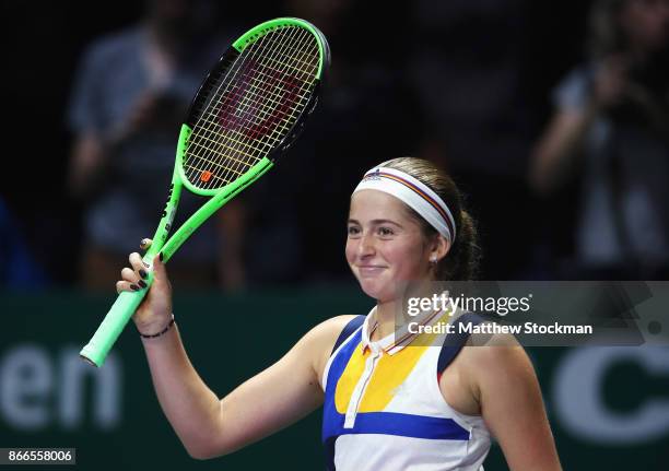 Jelena Ostapenko of Latvia celebrates victory in her singles match against Karolina Pliskova of Czech Republic during day 5 of the BNP Paribas WTA...