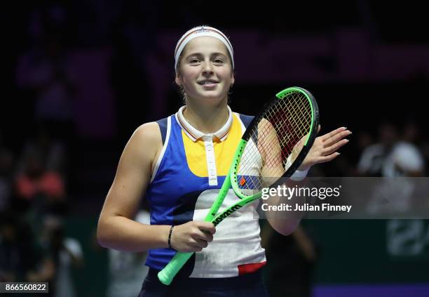 Jelena Ostapenko of Latvia celebrates victory in her singles match against Karolina Pliskova of Czech Republic during day 5 of the BNP Paribas WTA...