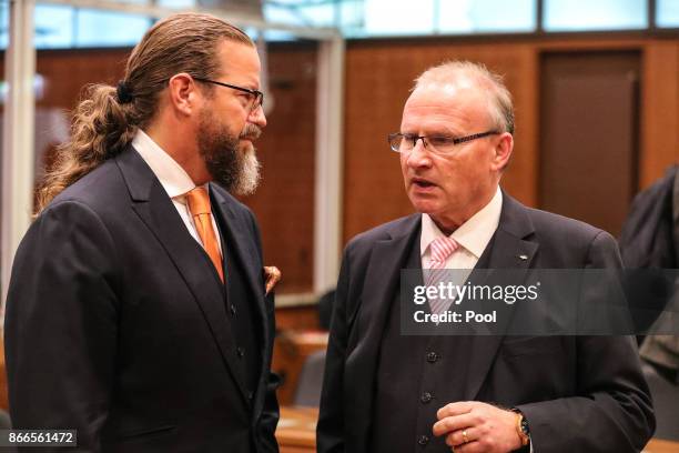 Robert Kain and Hannes Linke, lawyers of Daniel M., looks on ahead of their client's trial on charges of spying for the Swiss government, on October...