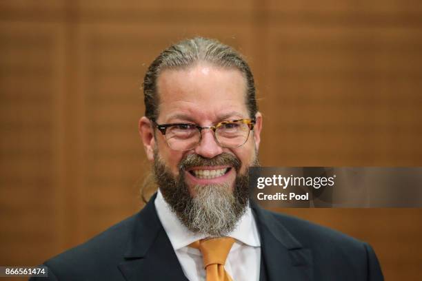 Robert Kain lawyer of Daniel M., looks on ahead of his client's trial on charges of spying for the Swiss government, on October 26, 2017 in Frankfurt...