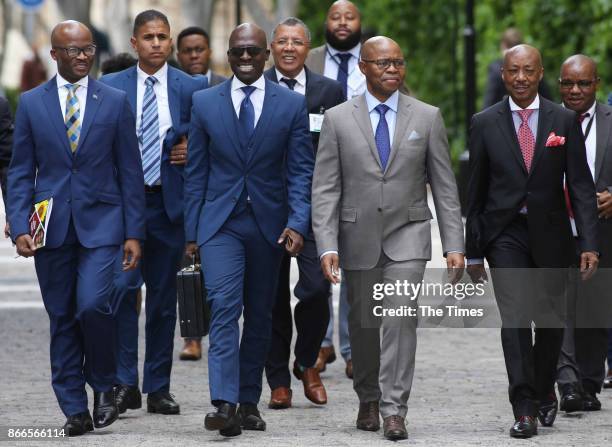 Finance Minister Malusi Gigaba is flanked on his right by treasury director-general Dondo Mogajane and on his left by his deputy Sfiso Buthelezi and...