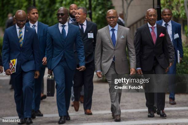 Finance Minister Malusi Gigaba is flanked on his right by treasury director-general Dondo Mogajane and on his left by his deputy Sfiso Buthelezi and...