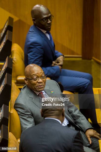 President Jacob Zuma and his deputy Cyril Ramaphosa share a moment during Finance Minister Malusi Gigabas his Medium-term budget speech in Parliament...