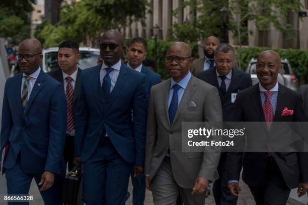 Finance Minister Malusi Gigaba is flanked on his right by treasury director-general Dondo Mogajane and on his left by his deputy Sfiso Buthelezi and...