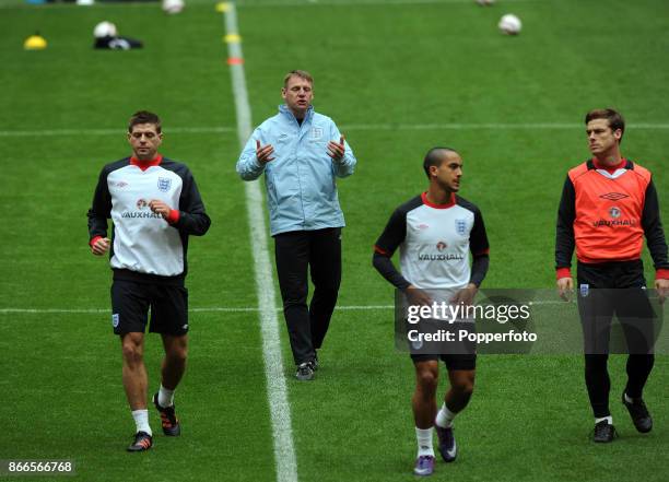 England caretaker manager Stuart Pearce puts his team through their training session before the International Friendly match between England and The...