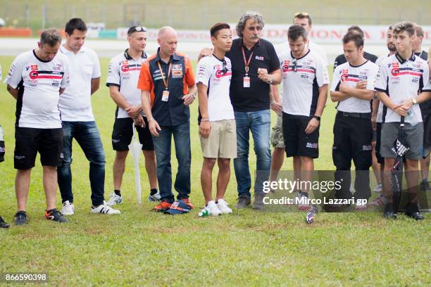 The MotoGp family pay a tribute to Marco Simoncelli's memory during the "Track walk to Turn 11 for SIC " ahead of the MotoGP of Malaysia at Sepang...