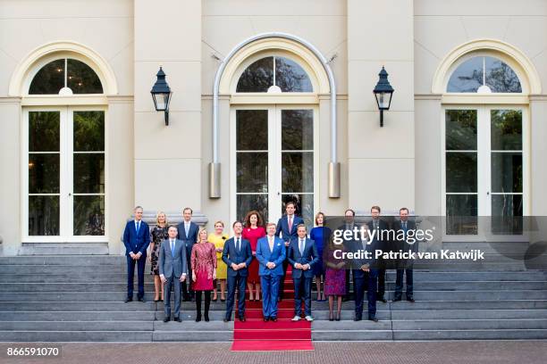 King Willem-Alexander and Prime Minister Mark Rutte present the new cabinet on the stairs of Palace Noordeinde on October 24, 2017 in The Hague,...