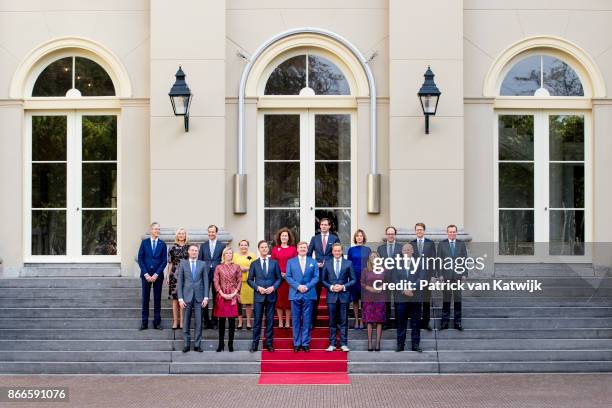 King Willem-Alexander and Prime Minister Mark Rutte present the new cabinet on the stairs of Palace Noordeinde on October 24, 2017 in The Hague,...