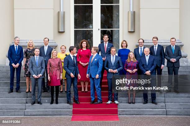 King Willem-Alexander and Prime Minister Mark Rutte present the new cabinet on the stairs of Palace Noordeinde on October 24, 2017 in The Hague,...