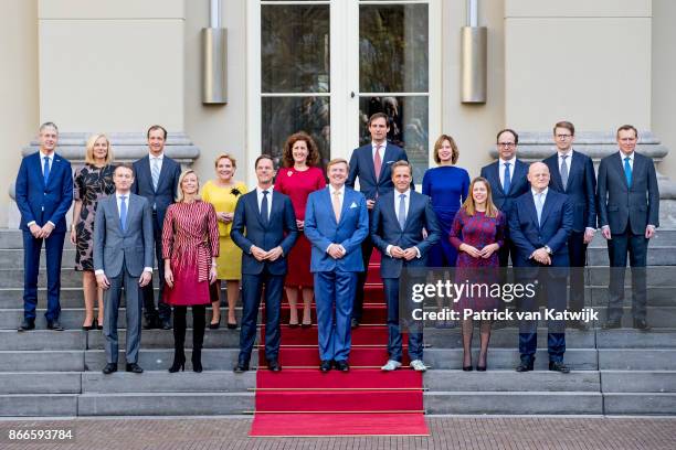 King Willem-Alexander and Prime Minister Mark Rutte present the new cabinet on the stairs of Palace Noordeinde on October 24, 2017 in The Hague,...