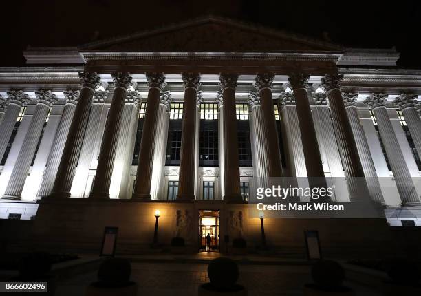 Man enters the United States National Archives building on October 26, 2017 in Washington, DC. Later today the National Archives will release more...
