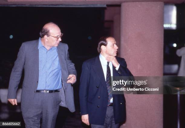 Italian politician Bettino Craxi talking with Silvio Berlusconi at the Fininvest studios in Milan, April 1987.