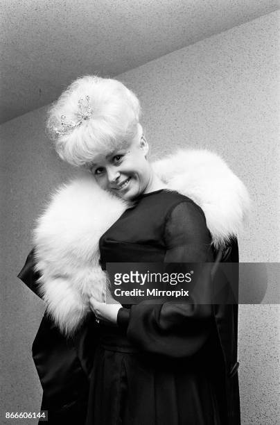Actress Barbara Windsor in her dress that she plans to wear for the Royal premiere of her new film 'Sparrows Can't Sing' at the ABC Cinema, Stepney,...