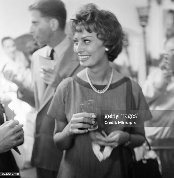 Cannes Film Festival 1958, picture shows Sophia Loren, italian actress, attends luncheon given in her honour, on her day of departure from festival,...