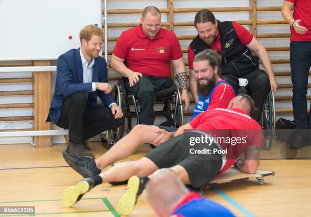 Prince Harry visits the Danish Veteran Centre where they watched a Rolling Floorball match, a sport invented by Danish veterans, on October 26, 2017...