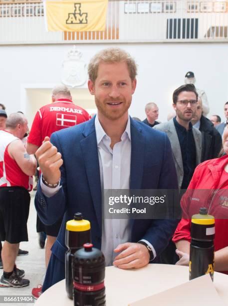 Prince Harry visits the Danish Veteran Centre where they watched a Rolling Floorball match, a sport invented by Danish veterans, on October 26, 2017...