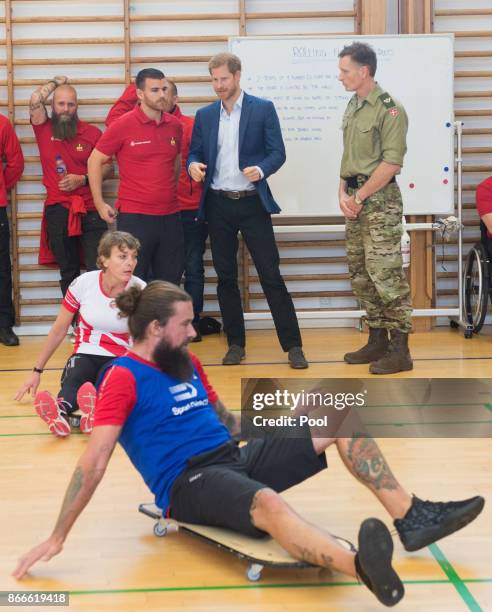 Prince Harry visits the Danish Veteran Centre where they watched a Rolling Floorball match, a sport invented by Danish veterans, on October 26, 2017...