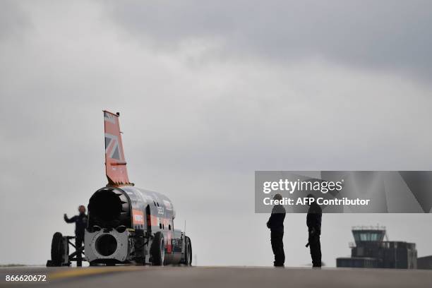 The engine of the Bloodhound supersonic car is started as Andy Green, Royal Air Force Wing Commander prepares for a test run at the airport in...