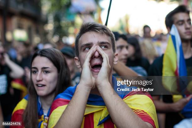 Protesters march during a Catalan pro-independence strike of university students on October 26, 2017 in Barcelona, Spain. The Parliament of Catalonia...