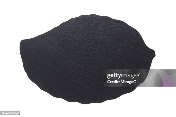 leaf shape black stone tray plate on white - schist fotografías e imágenes de stock