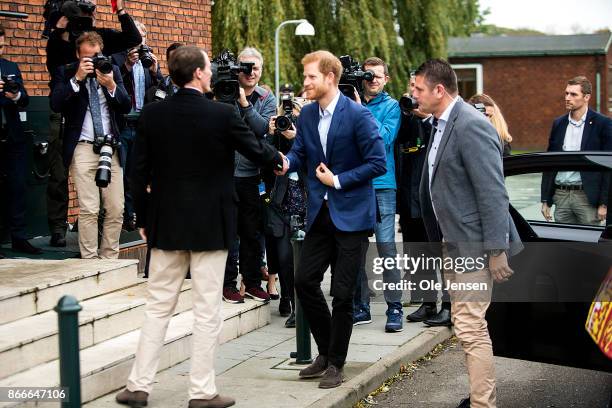 Prince Harry is welcome by Danish Prince Joachim to the Danish Defence Center for Military Physical Training at Svanemoellen Barracks during his two...